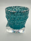 Small container/Aqua /chunky glitter silver/weighs 4.3 ounces item 86