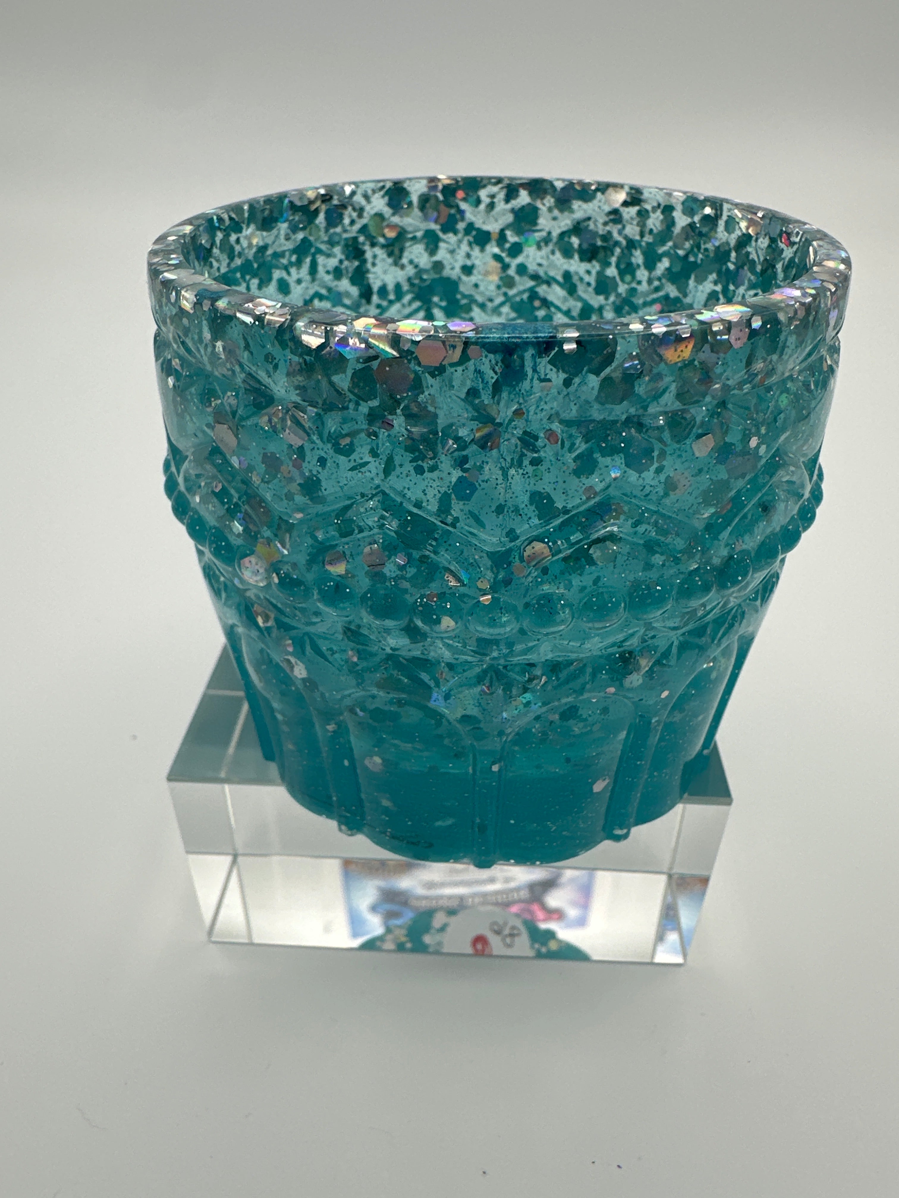 Small container/Aqua /chunky glitter silver/weighs 4.3 ounces item 86