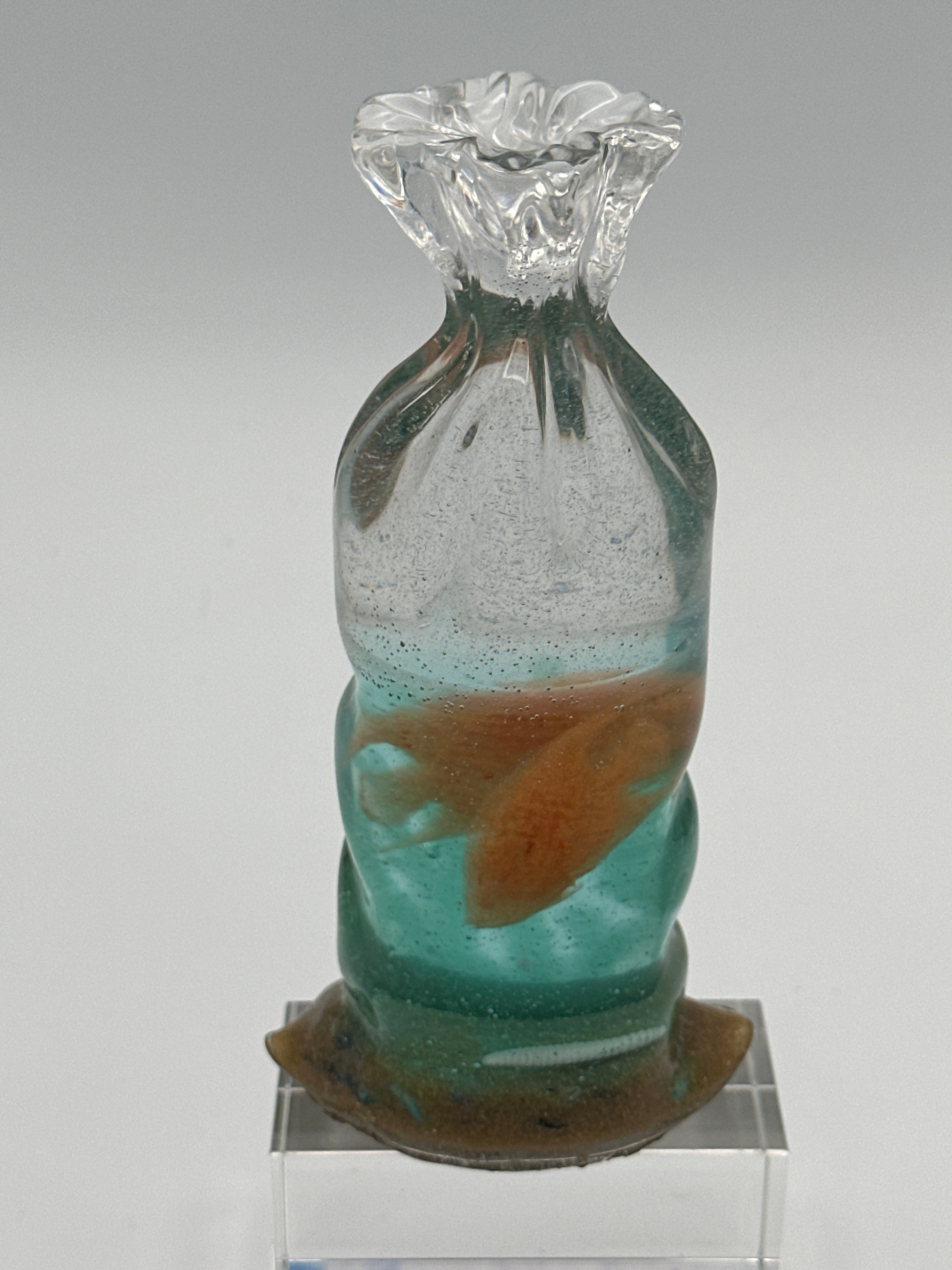 Bag of goldfish created with epoxy/height is 6 1/4 inches width is 3 inches /weight is 11.5 ounces /item 321