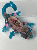 Gecko Aqua with pink flowers and pink/ purple jewels. Item 326