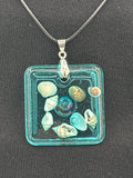 Pendant / 1.5 inch /teal glitter/seashell iridescent pearl center
item 5