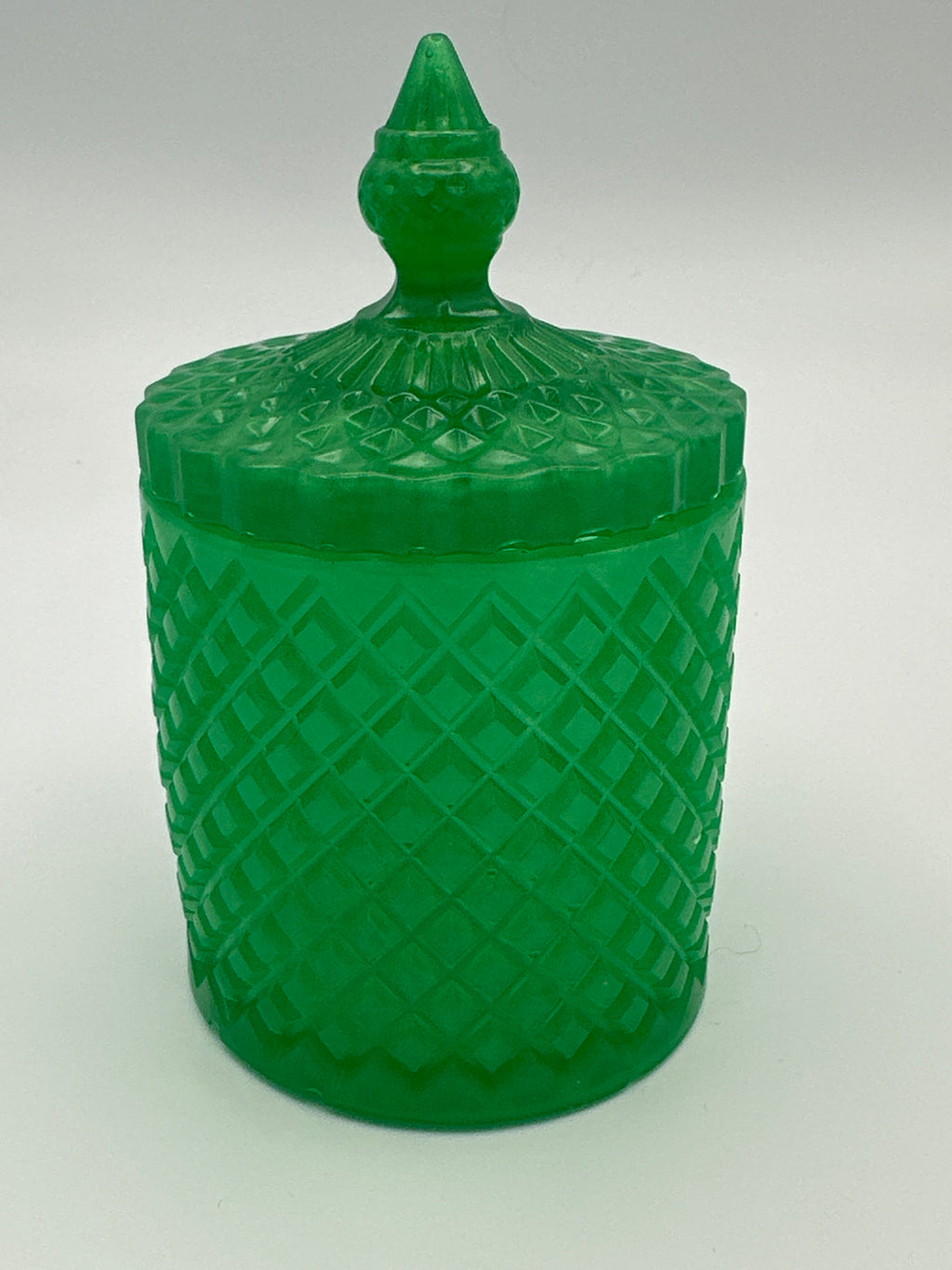 Container with lid 6 inches tall/green/weight is 8.5 ounces / item number 204