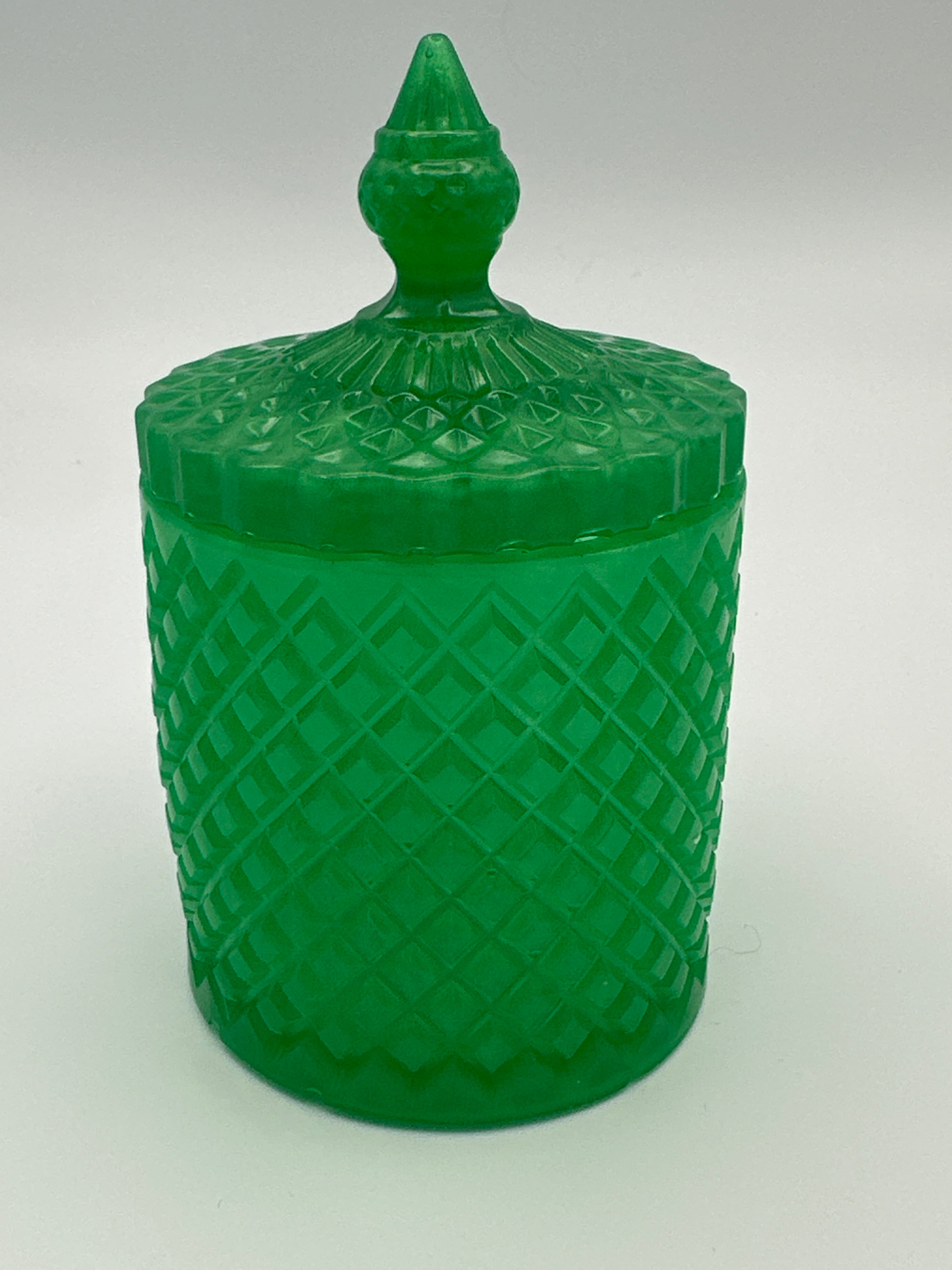 Container with lid 6 inches tall/green/weight is 8.5 ounces / item number 204
