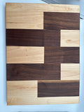 Black walnut and Maplewood
13 inches long
17 1/2 inches wide

3/4 inch thick