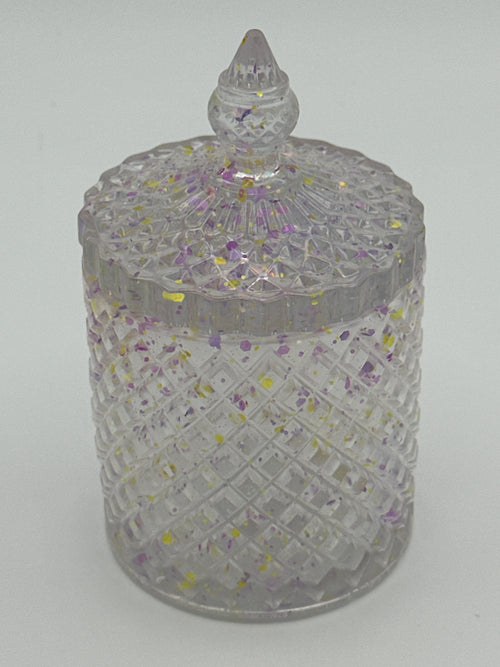 Container with lid is 6 inches in height/color  is clear with purple and flecks. / item number 70