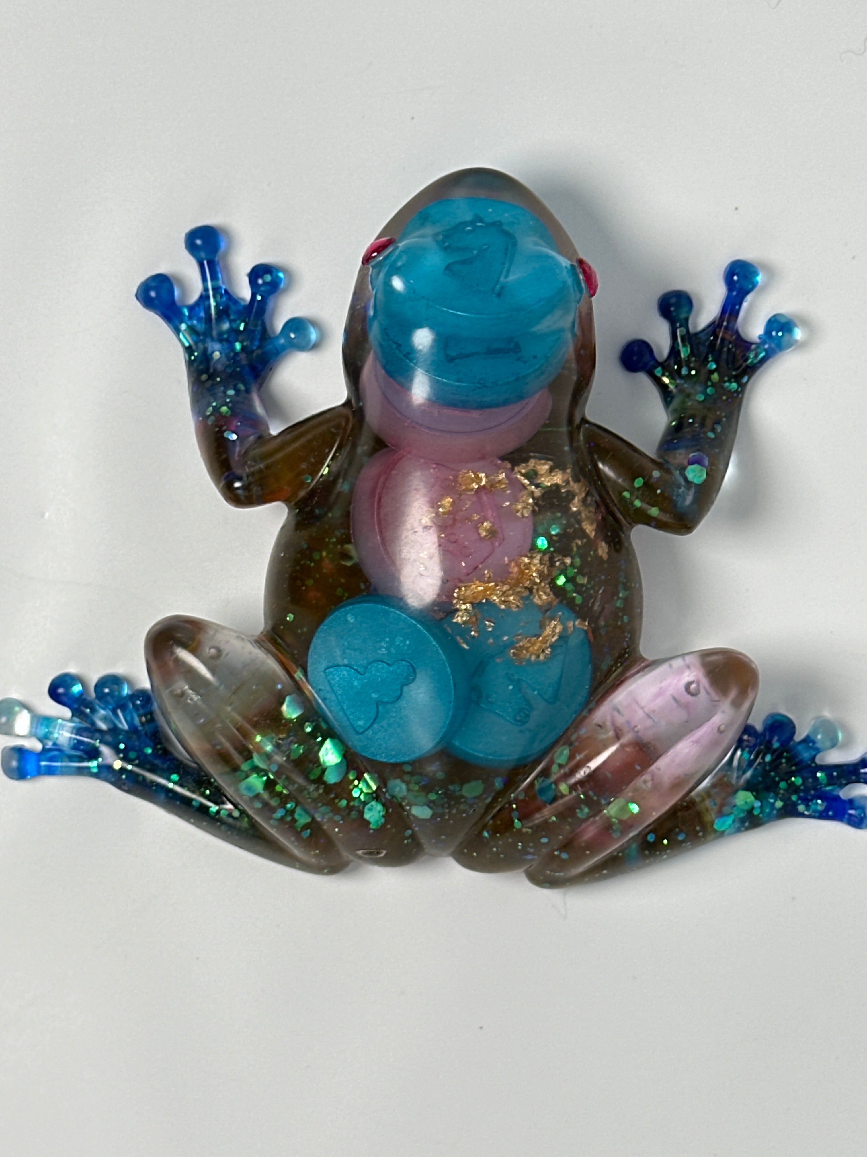Frog Fancy / blue/ pink and blue checkers. Pink faux crystal eyes. Item 300