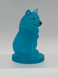 Wolf sitting 4 inches tall / aqua / hand painted face.  Item 259