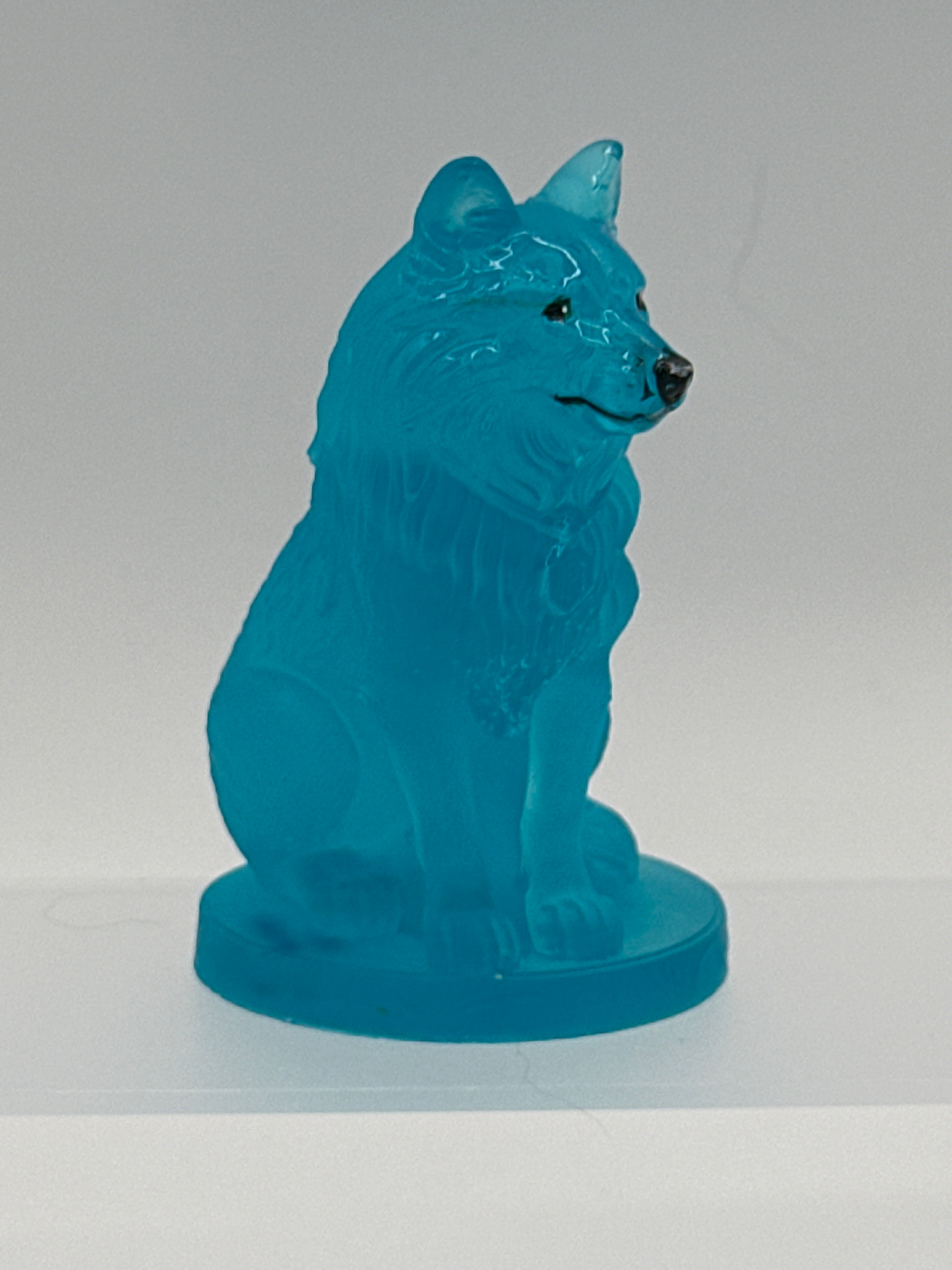 Wolf sitting 4 inches tall / aqua / hand painted face.  Item 259