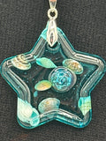 Pendant / 1.5 inch /teal glitter/seashell iridescent pearl 
item 6

measures 1.5” by 1.5”