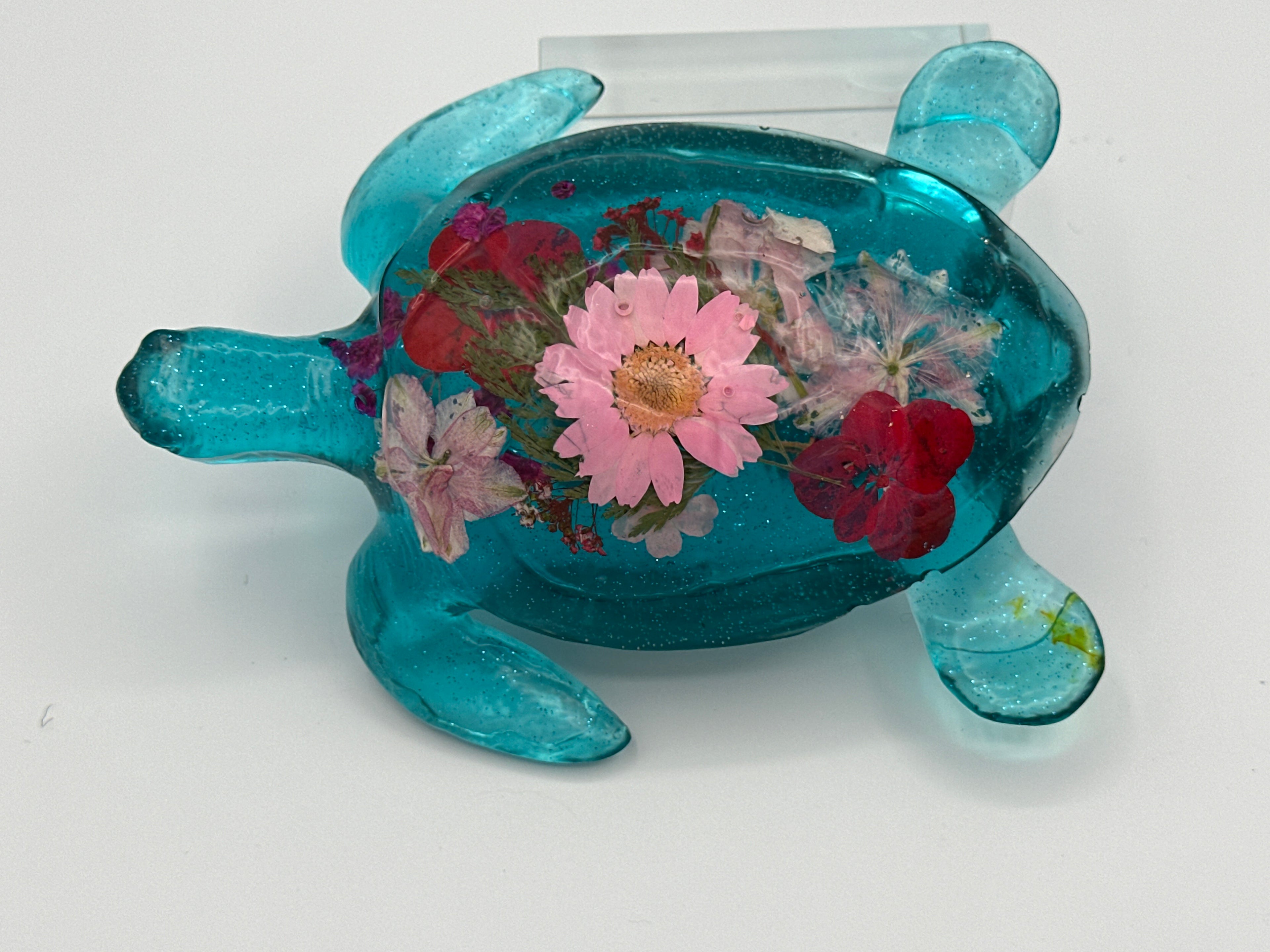 Sea turtle medium 6 inches long/color aqua/Floral/ weight 9.0 ounces /item 235