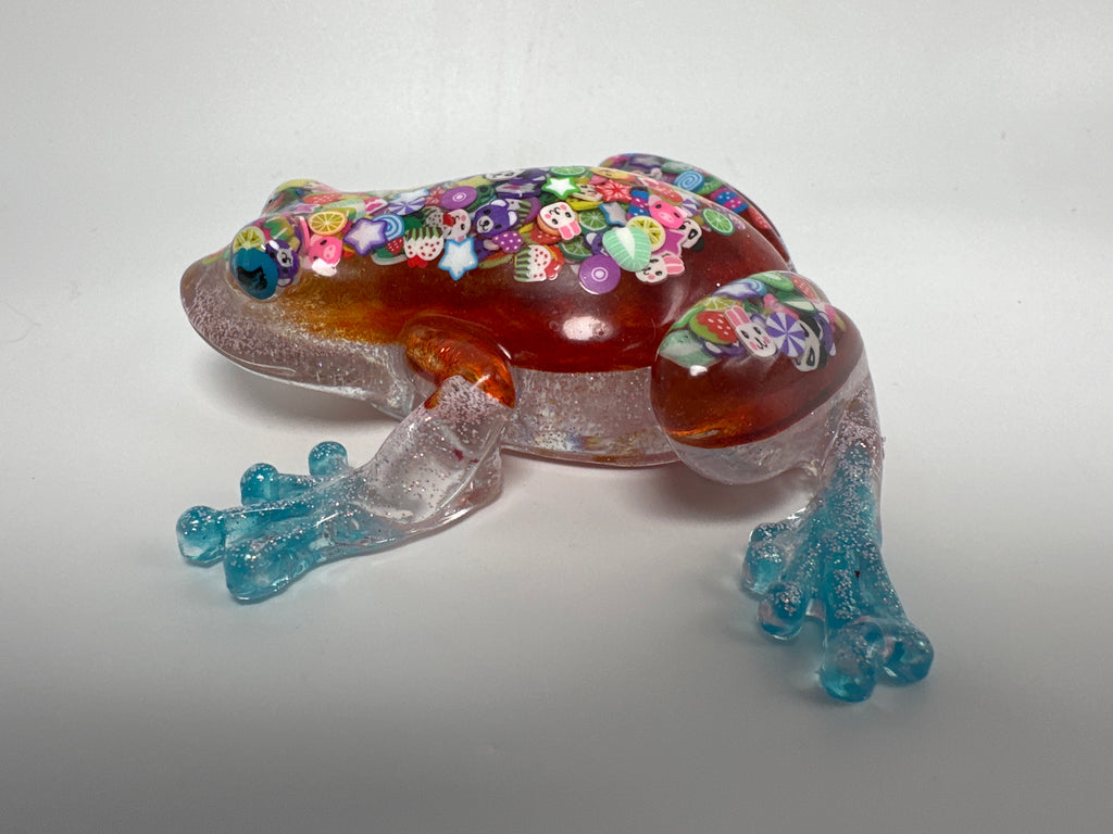 Frog Fancy orange with confetti/ pink glitter. Go after your dreams on underbelly. Item 63