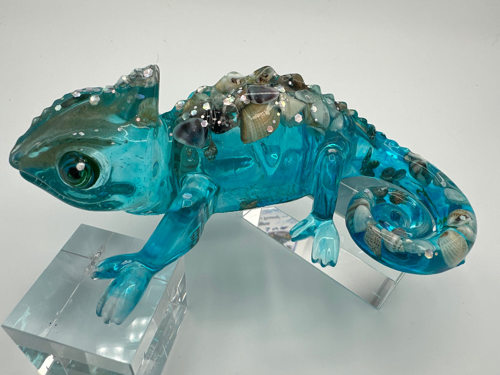 Gecko/aquamarine/seashell/chunky glitter/fish in head/weight is 7.2 ounces/item 69 ￼