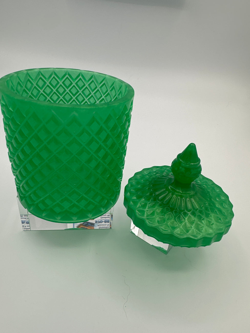 Container with lid 6 inches tall/green/weight is 8.5 ounces / item number 204
