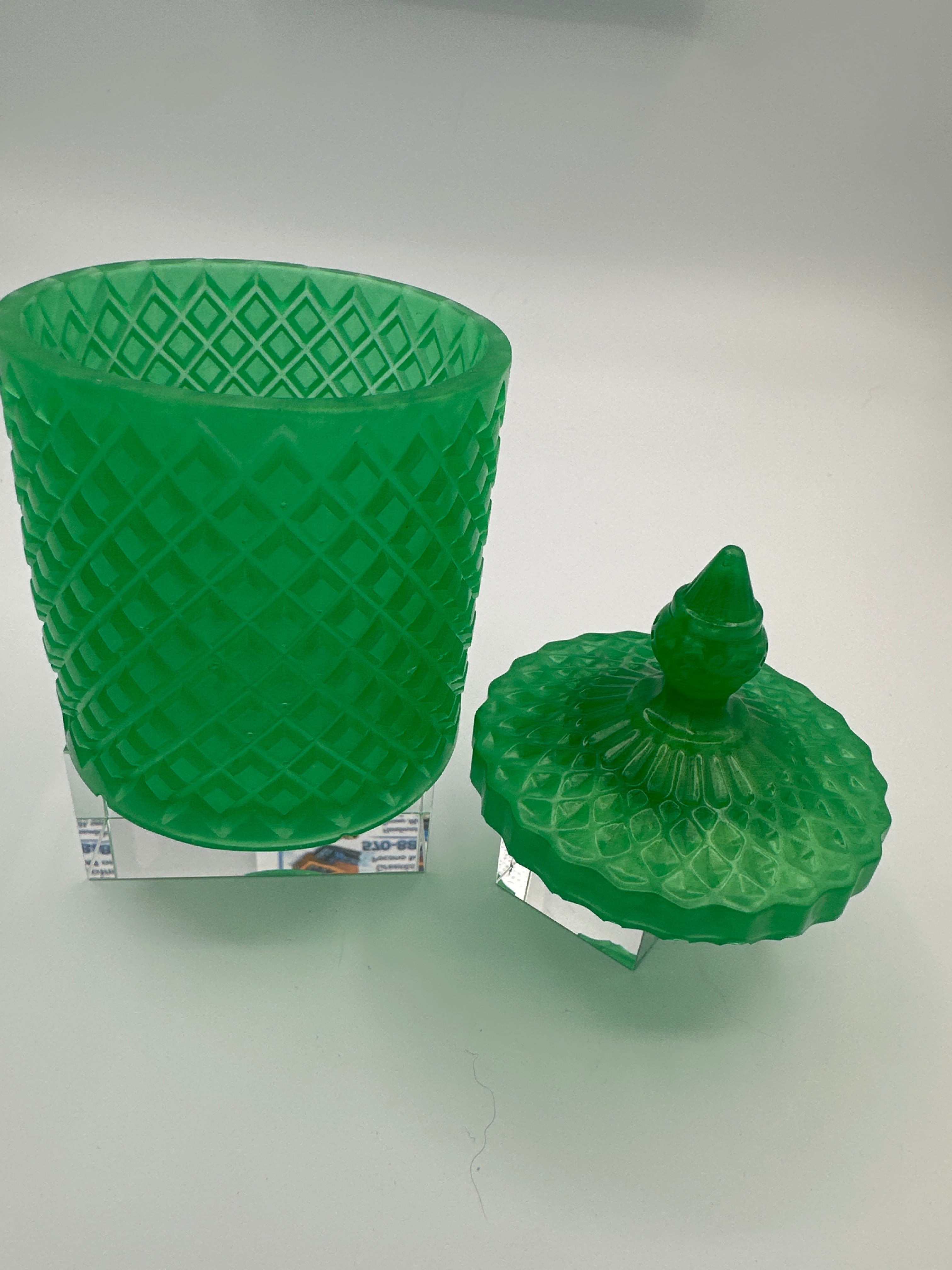 Container with lid 6 inches tall/green/weight is 8.5 ounces / item number 204