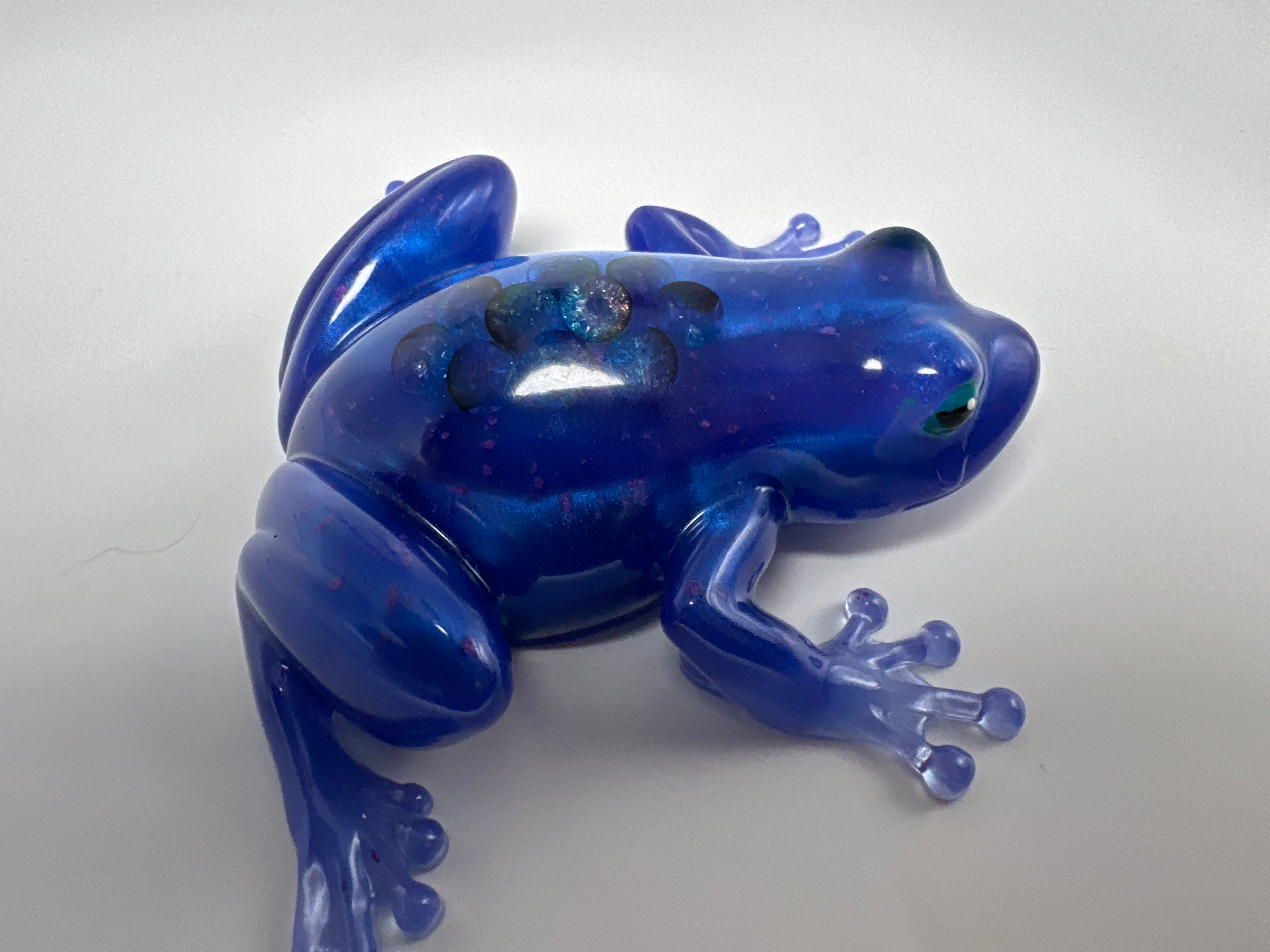 Frog Fancy blue with crystals in its back. Item 57
